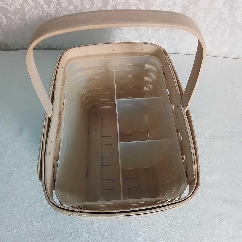 Longaberger light tan woven basket with handle and plastic insert